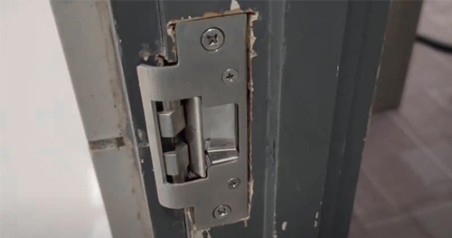 What is an electric strike lock, and how does it work?